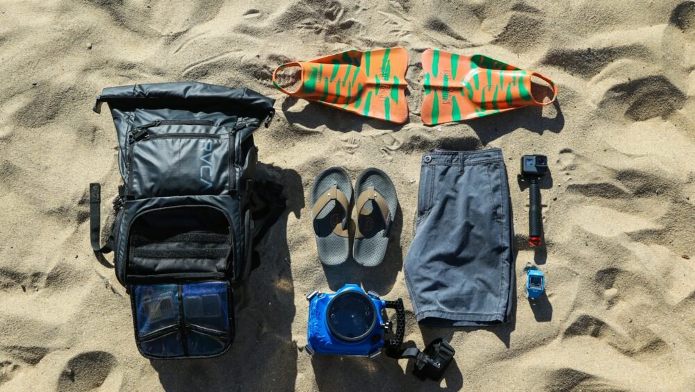 Flat-lay of travel essentials packed for a European backpacking trip